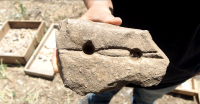 Ancient stone slab for creating fire in Beit Shemesh 4.PNG
